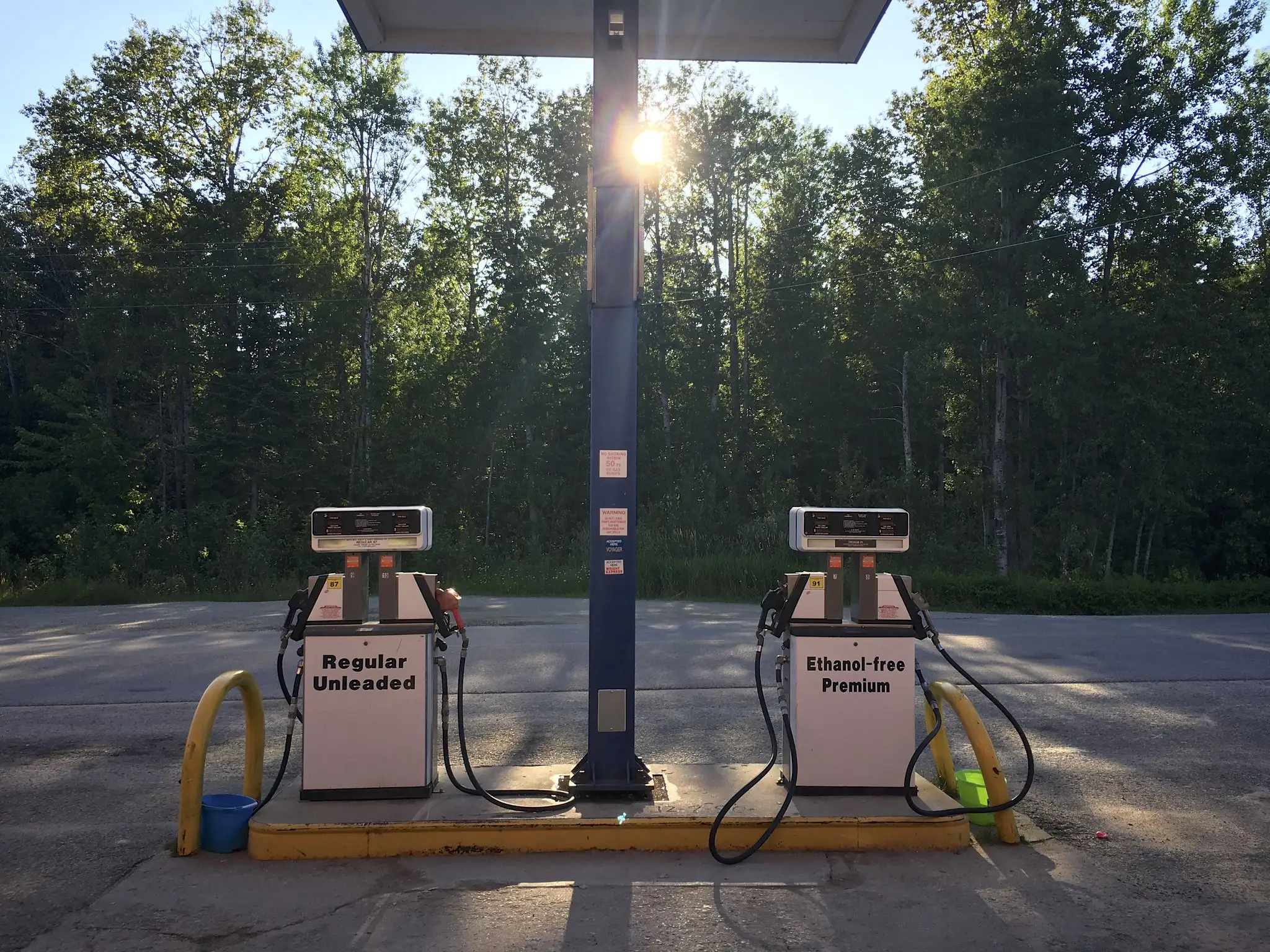 A rural gas station with ethanol and ethanol-free gasoline options.